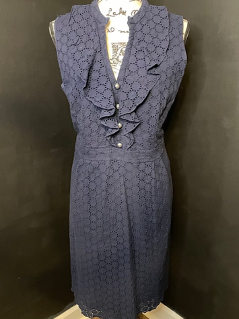 Chadwick’s dark blue ruffled dress